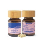 Utopia Tranquil 50mg microdose capsules with two bottles and capsules shown.